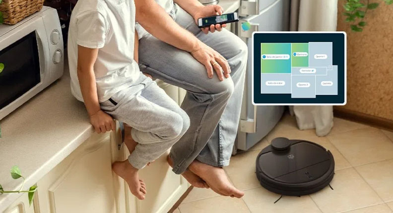pai e filho sentados na bancada da cozinha enquanto configuram o smart robô aspirador wi-fi da Positivo Casa Inteligente